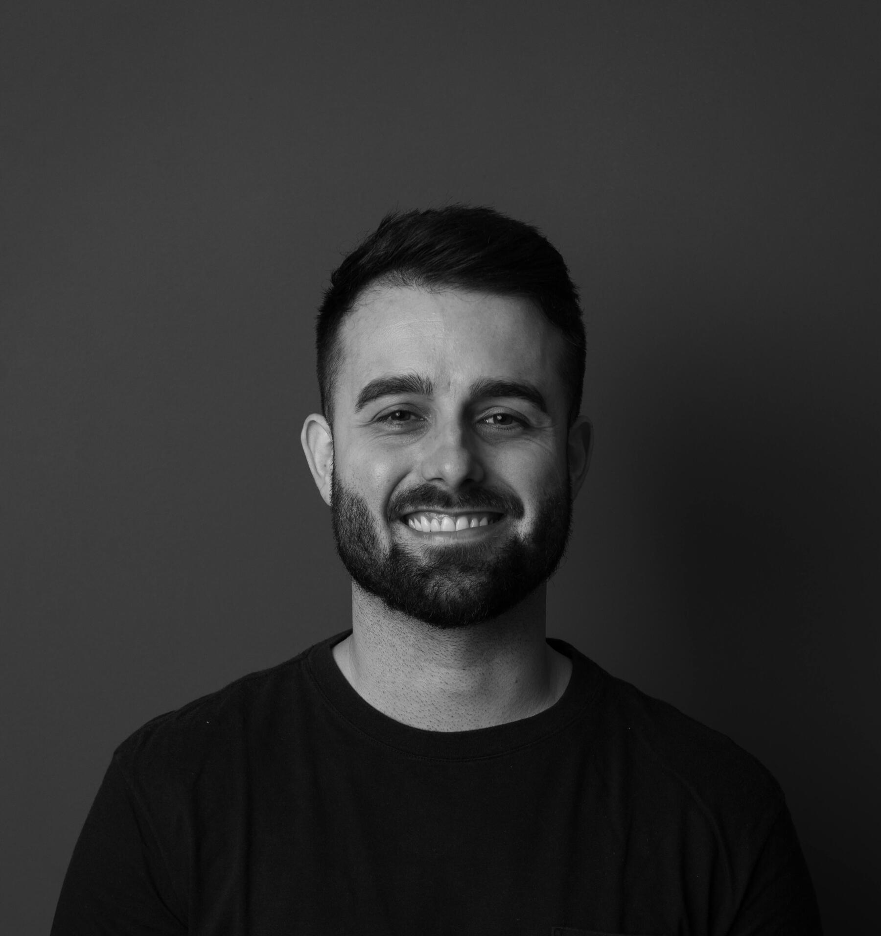 white graphic of the letters & Systwms