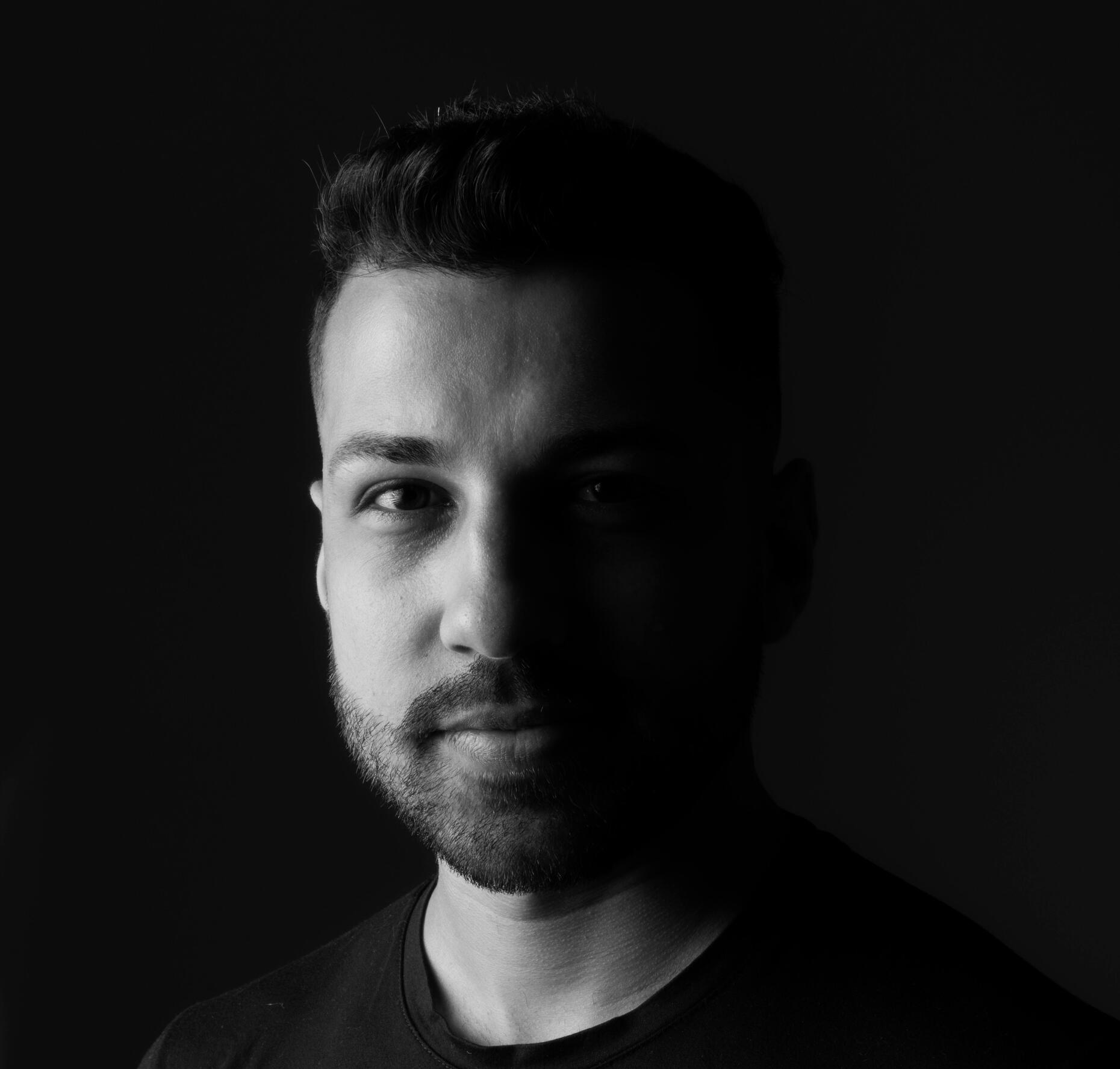 white graphic of the letters & Systwms